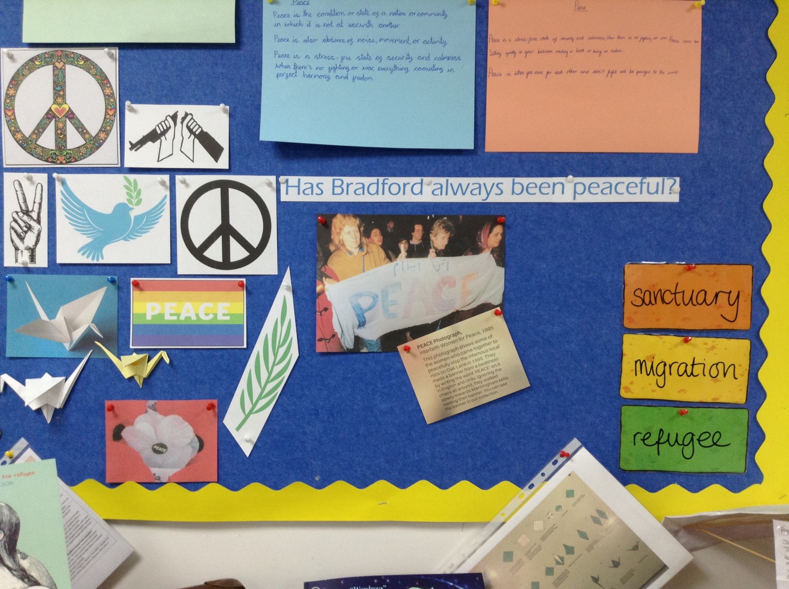 Symbols of peace, including paper cranes