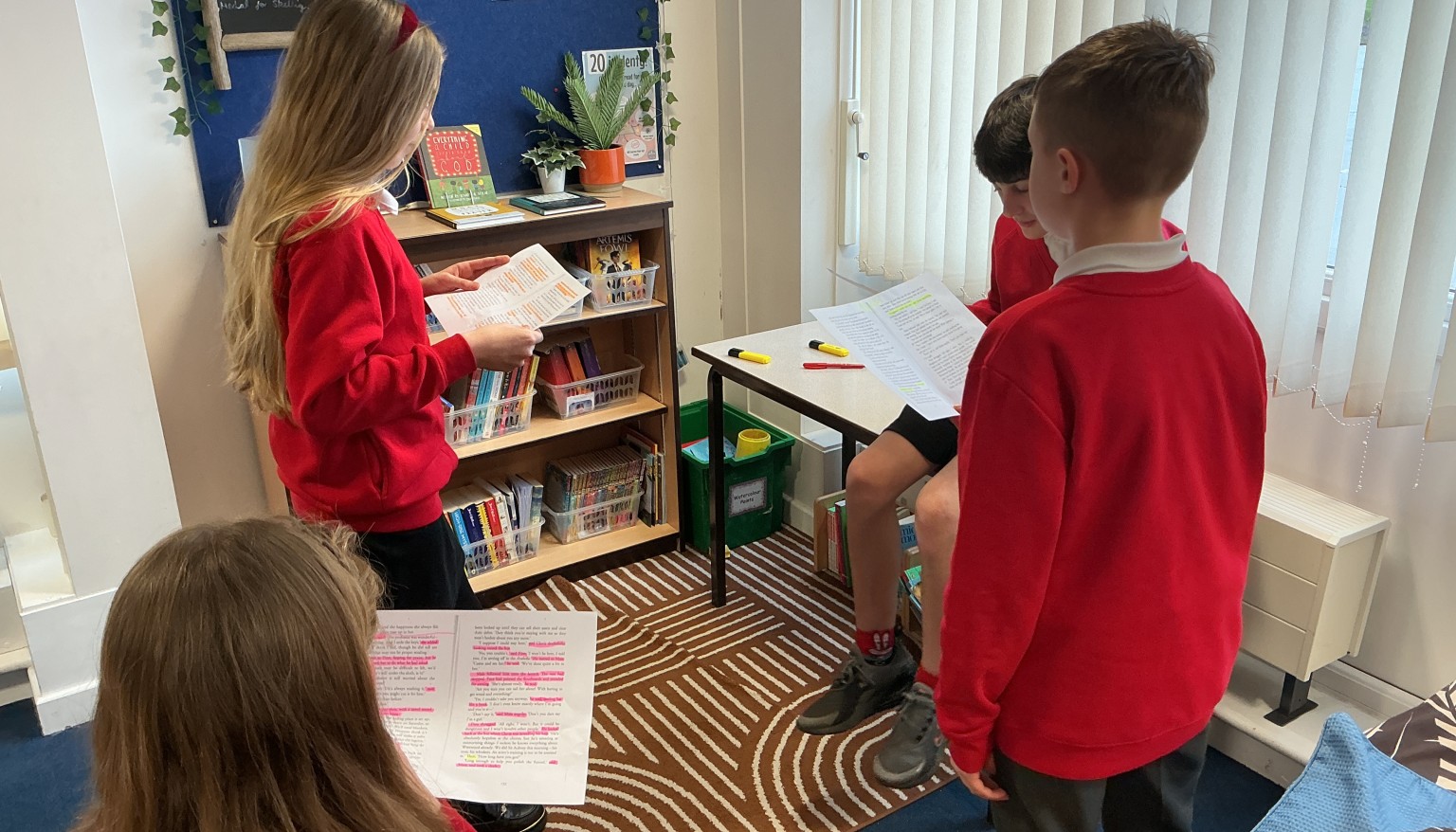 Rehearsing in the reading corner.