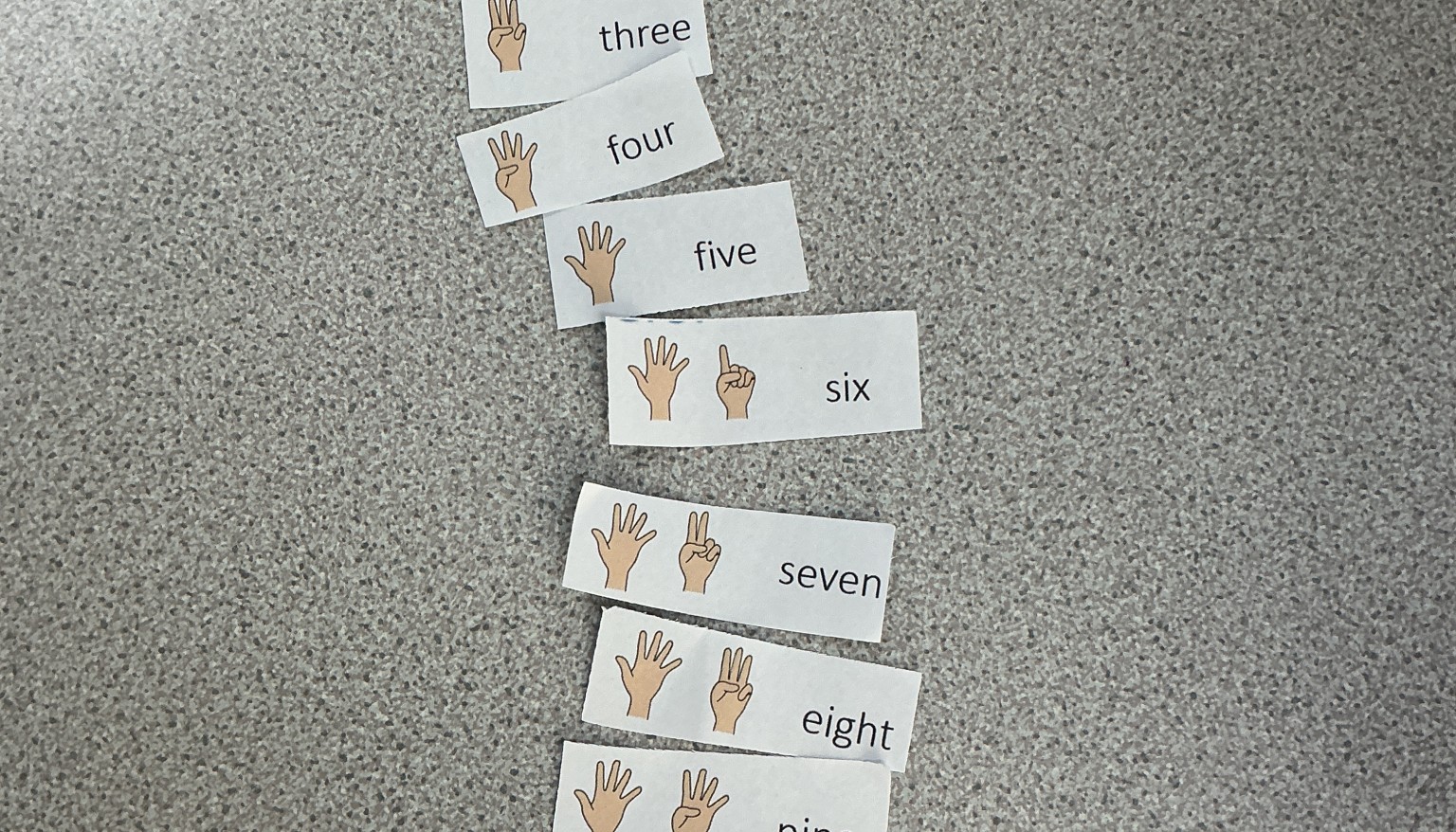 Using the pictorial representation, we put the numbers in order and had a go at reading the words. 