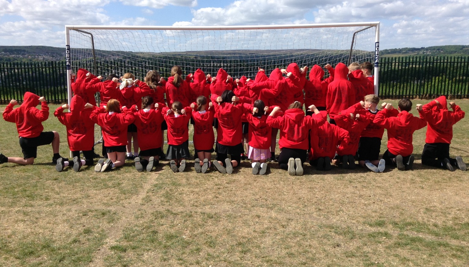 Children in their hoodies.