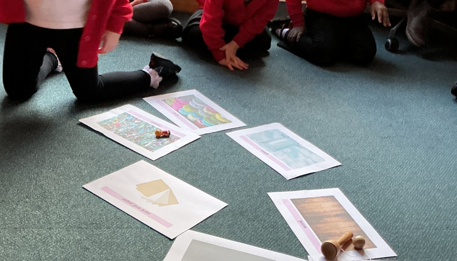 Sorting toys by their materials.