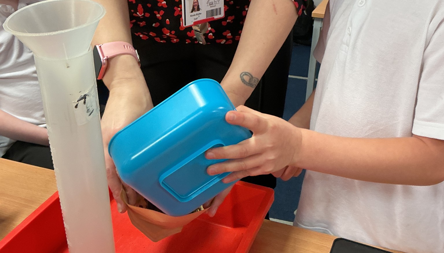 Placing the weighed soil into filter paper