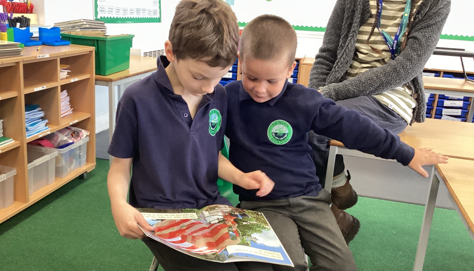 Year 1 & Year 3 children reading together