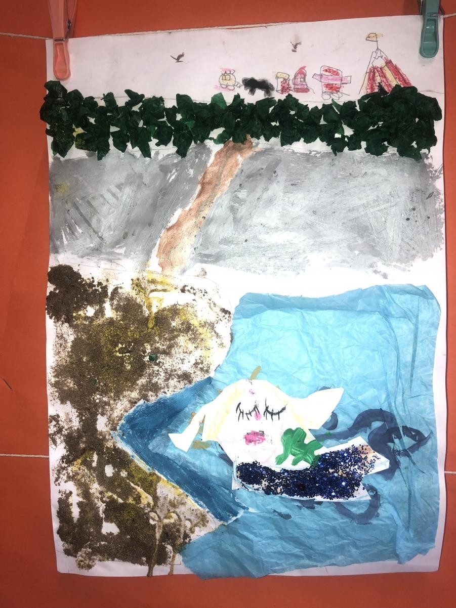 We made our own collages based on Julia Donaldson's The Singing Mermaid 