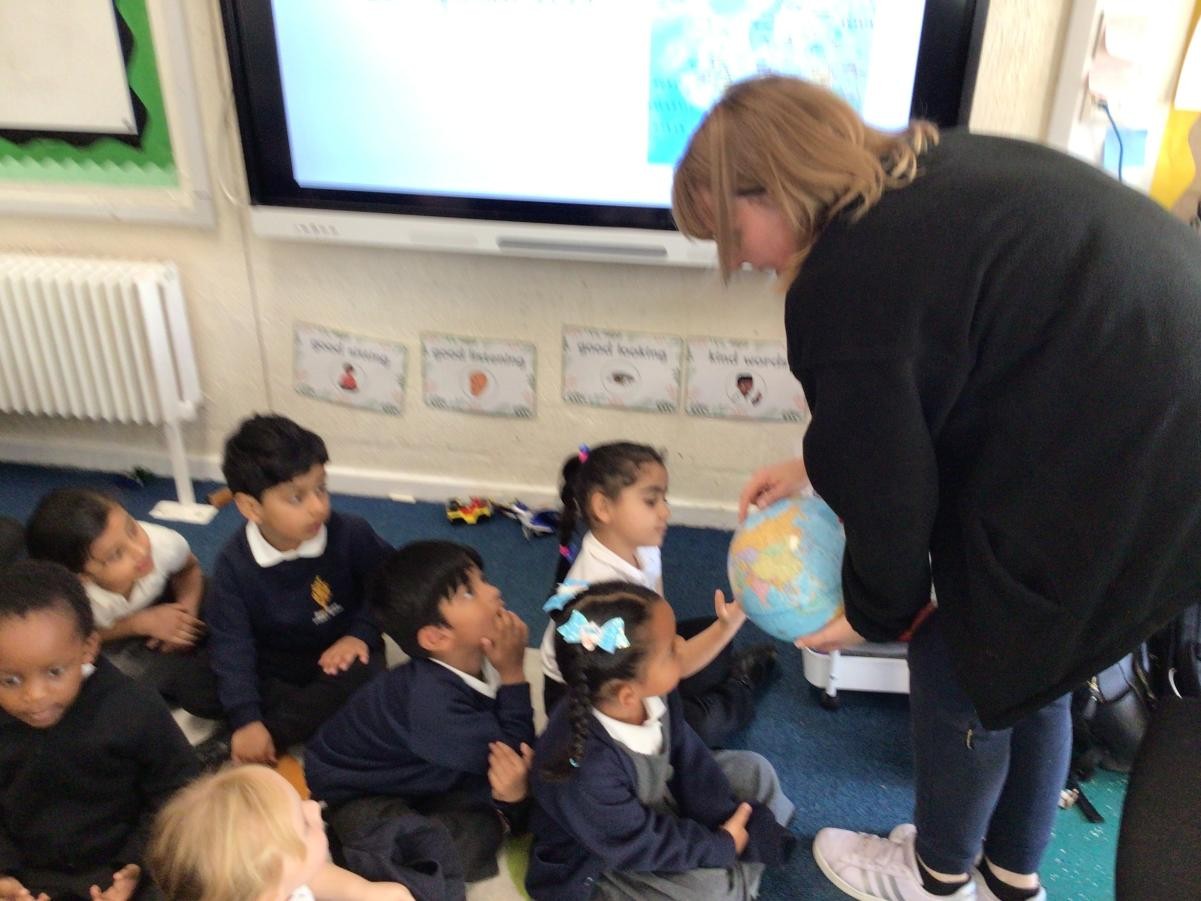 We all looked at a globe to see if we could find Italy. 