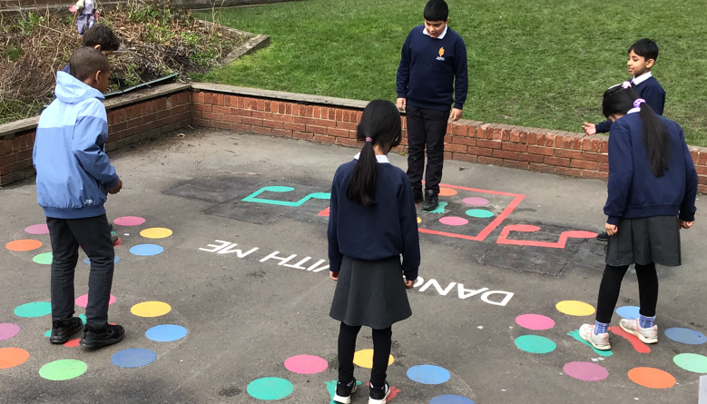 Children playing onthe dance mats