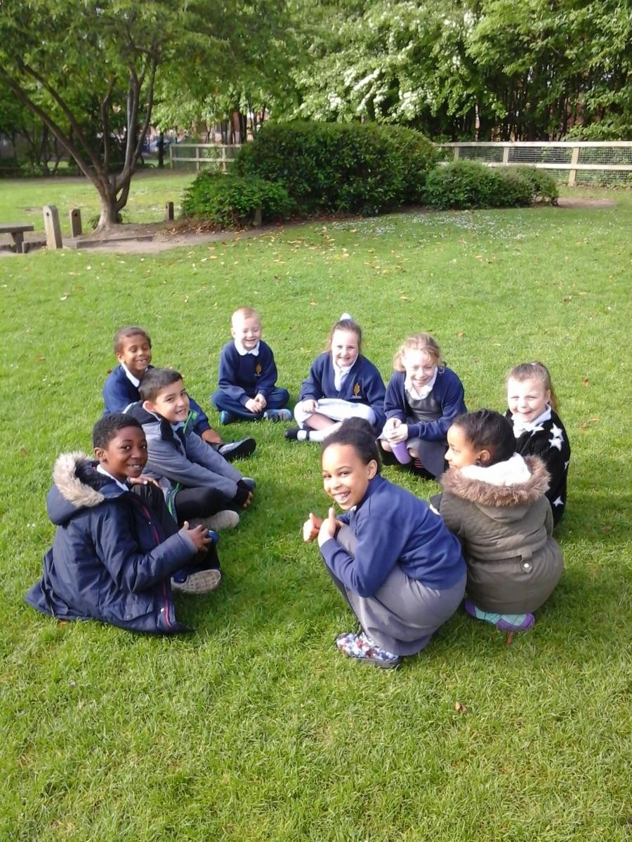 We enjoy playing games in our school garden.