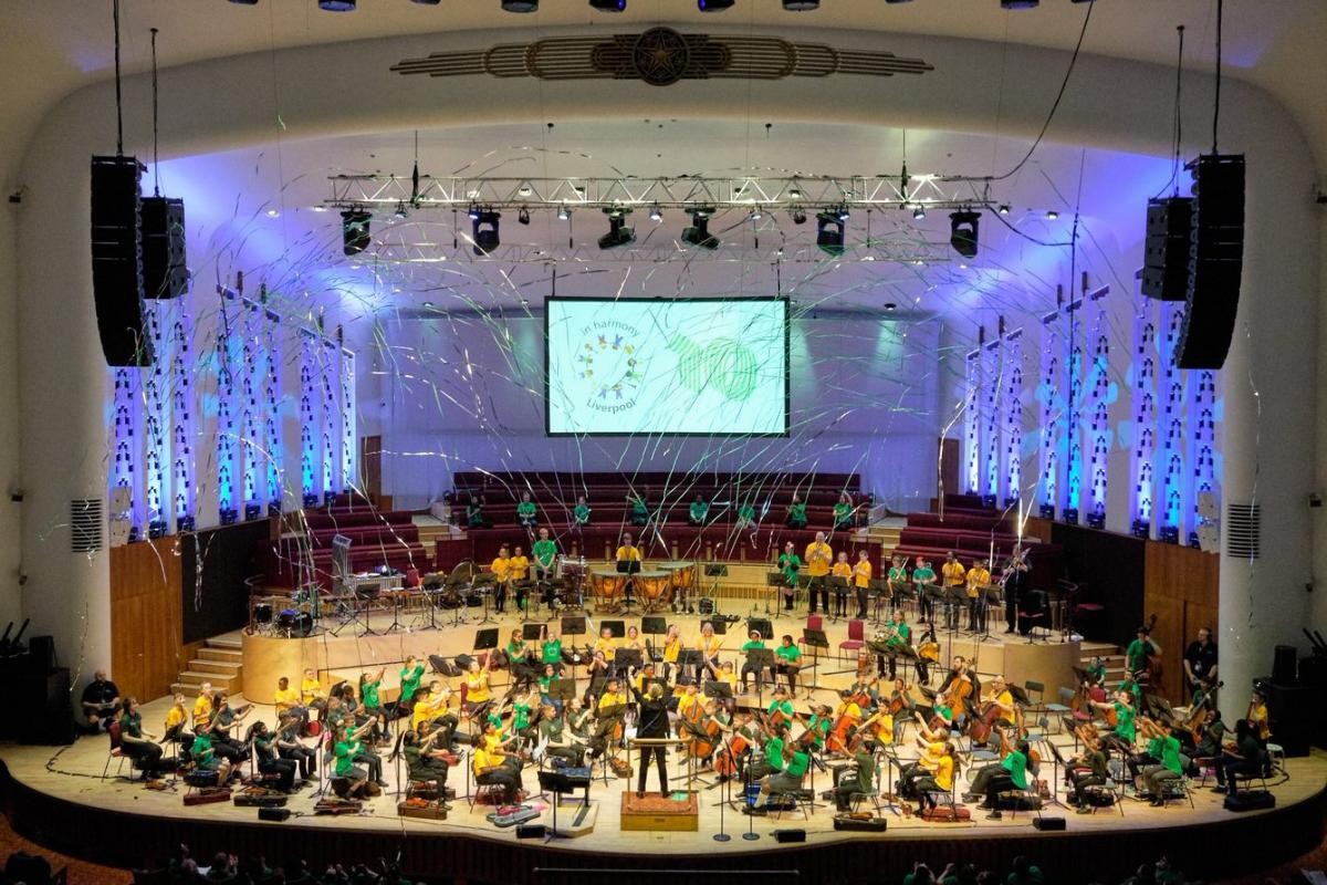 Hawthorn Primary Symphony Orchestra performing alongside In Harmony Liverpool and In Harmony Opera North, at Liverpool Philharmonic Hall.