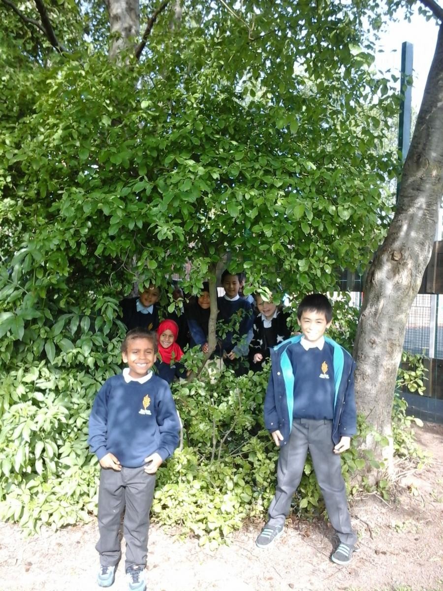 We enjoy playing games in our school garden.