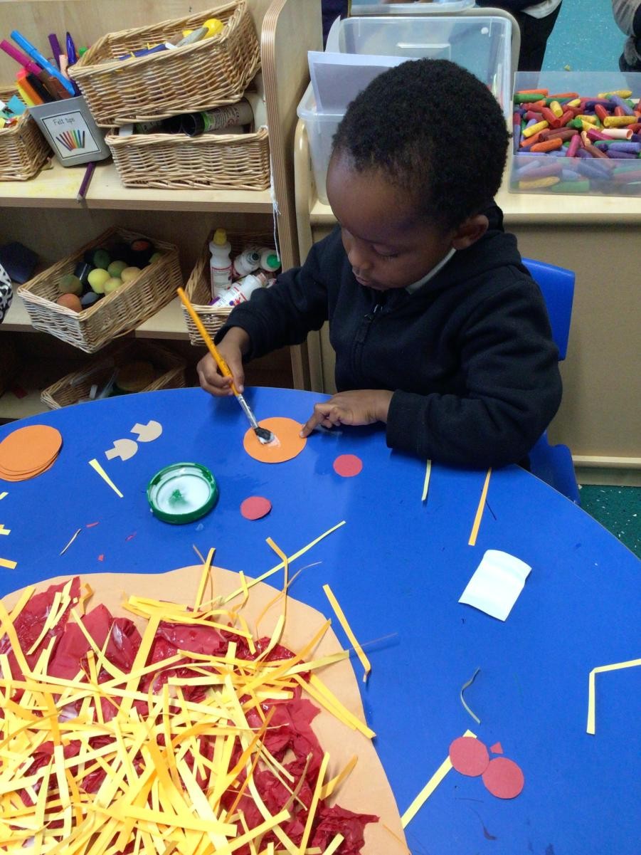 making big pizzas to show at our sharing assembly.