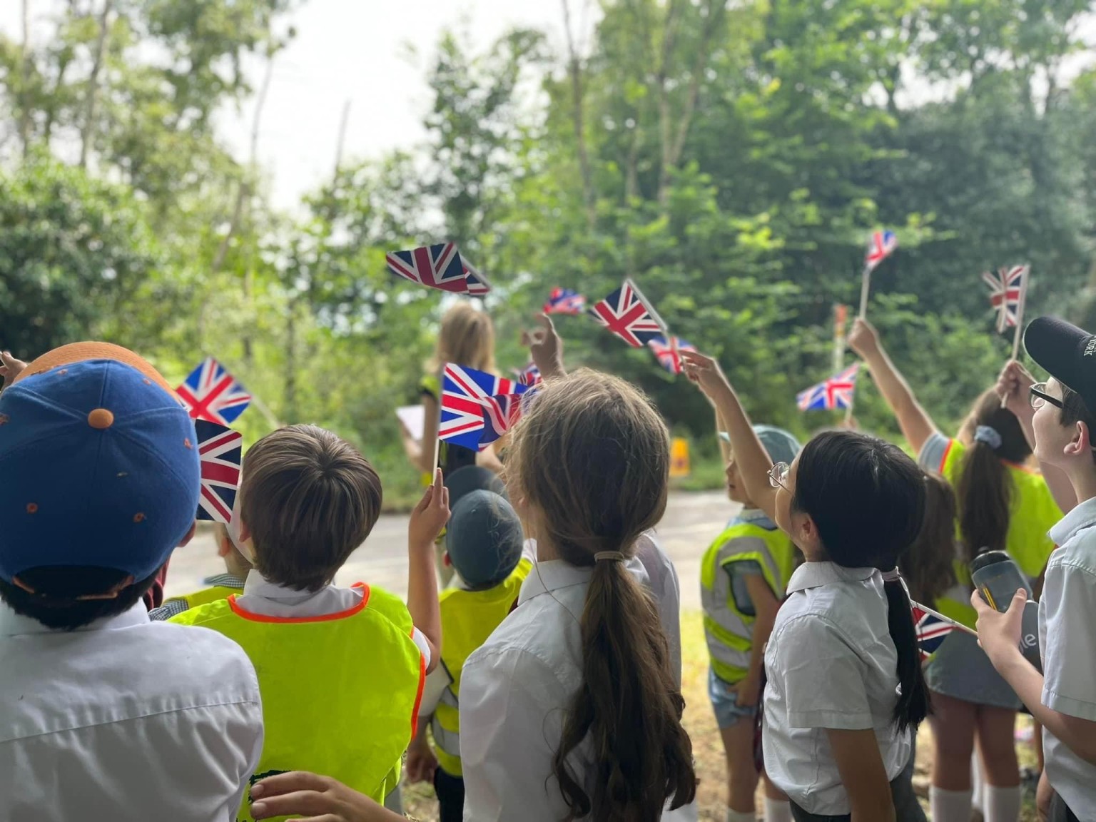 Every summer, we walk the whole school to watch the Royal procession pass on its way to Royal Ascot