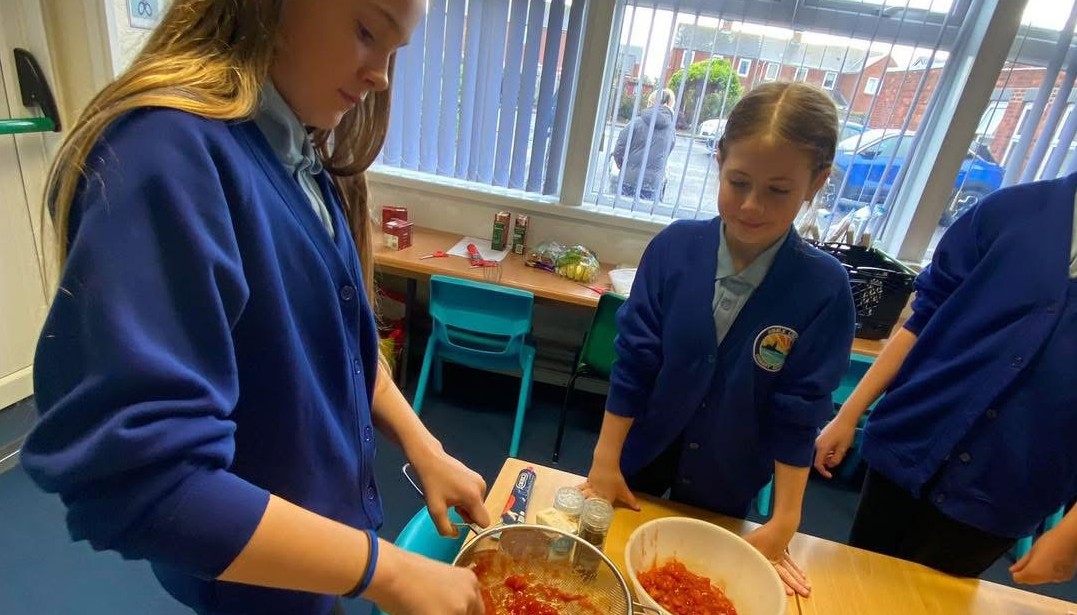 Year 5 preparing ingredients for thir 3 course meal