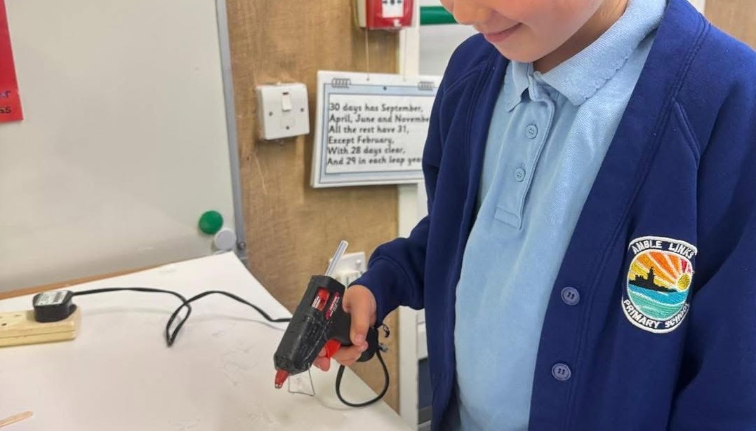 Year 4 using glue guns to creat a sturdy structure
