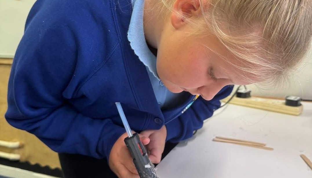 Year 4 using glue guns to creat a sturdy structure