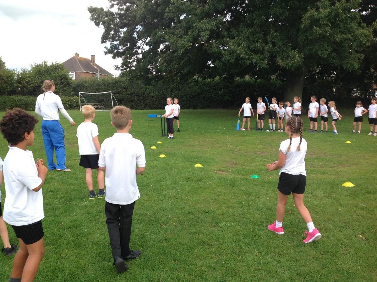 Sophie bowling in the game of Bats