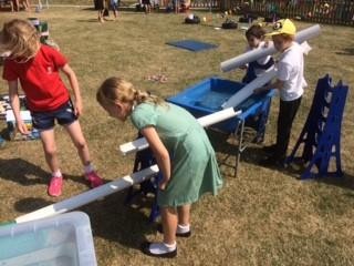 How can we get this to flow from one tank to the next?