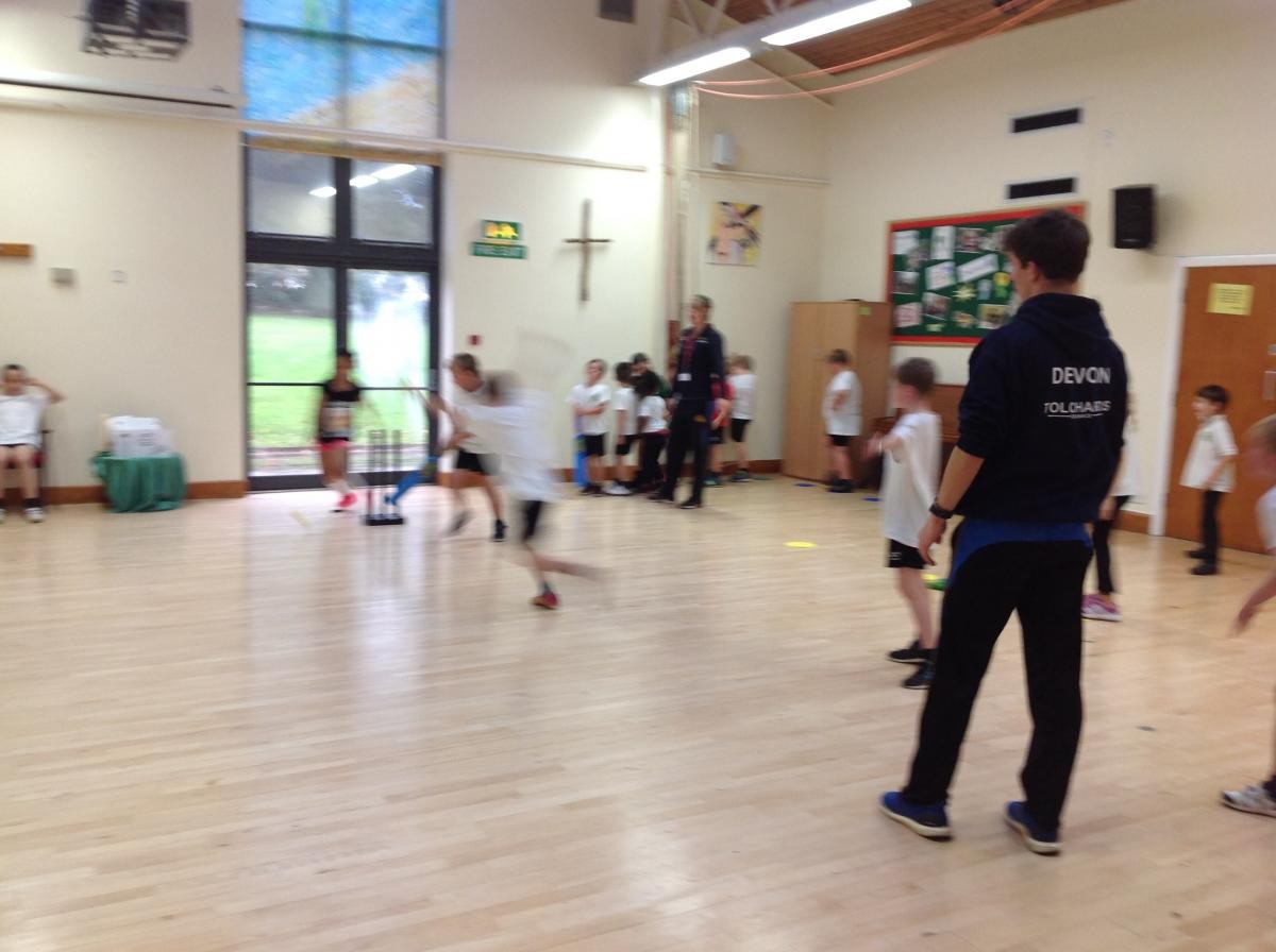  We had to use a soft ball and have the Cricket match inside because of the rain.