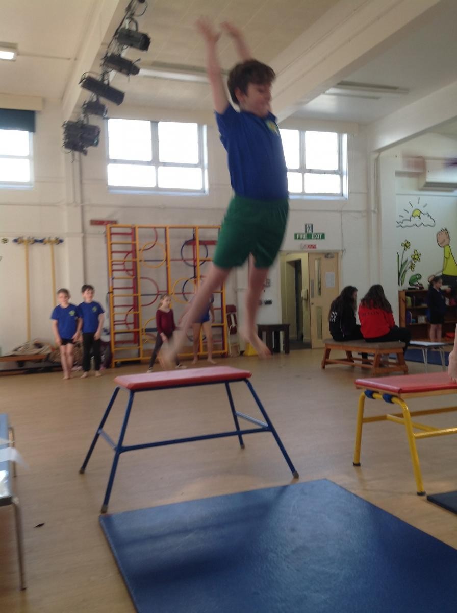 Vault including a straight jump.