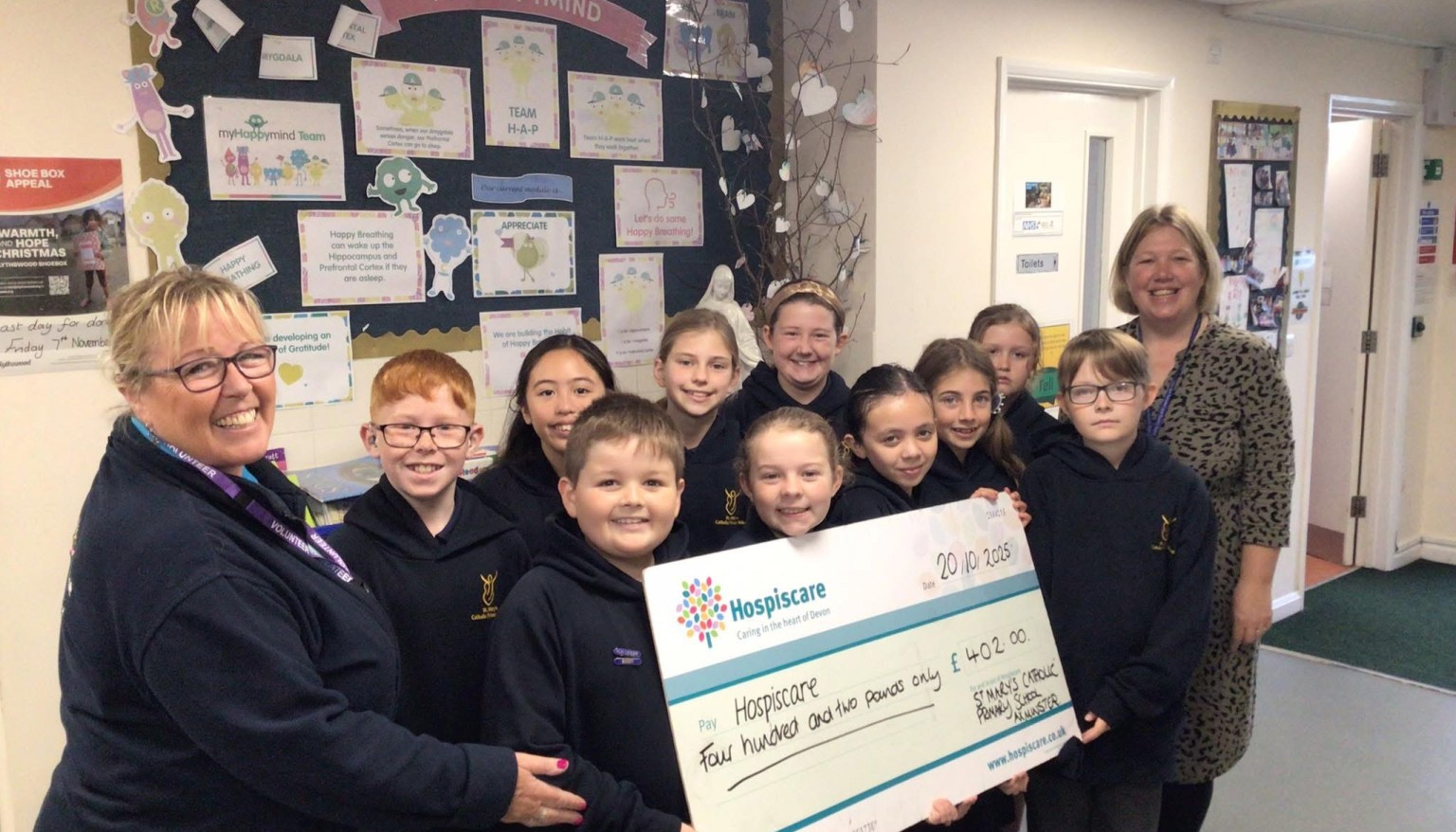 Presenting our cheque to Hospiscare