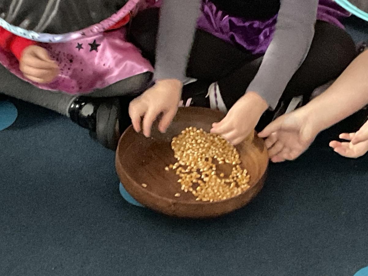 Cooking popcorn!  Learning about where our food comes from!