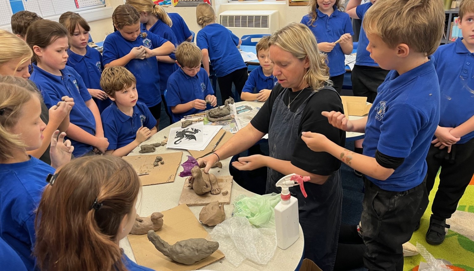 Making clay dragons.