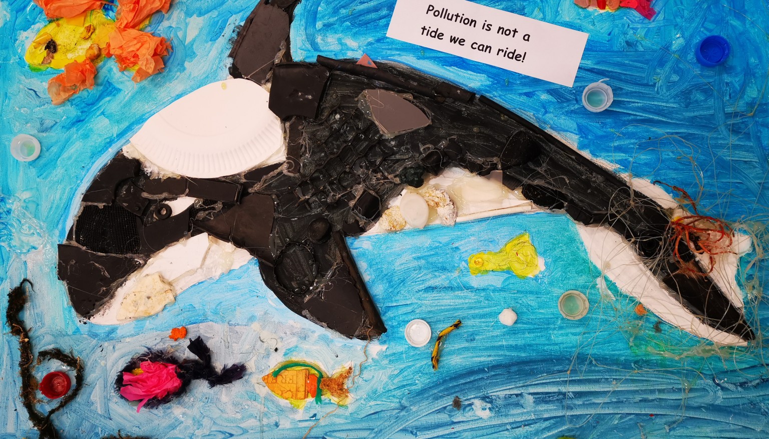 Artwork for Surfers Against Sewage using beach-cleaned plastic.