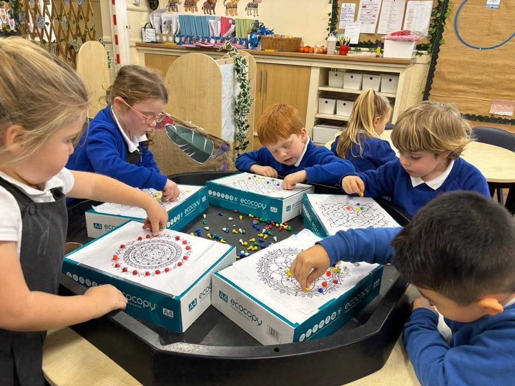 The children liked making their own Rangoli patterns