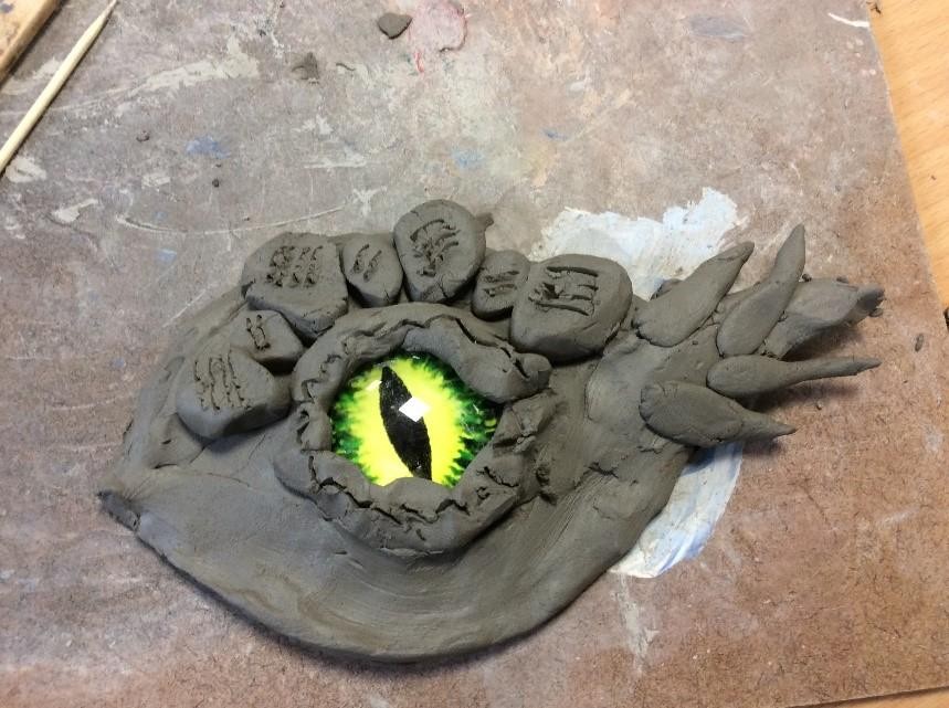 Clay dragon eyes in Year 5