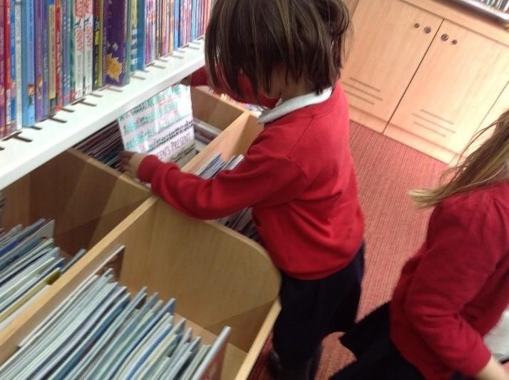 Choosing books from the Education Library Service van for our class libraries