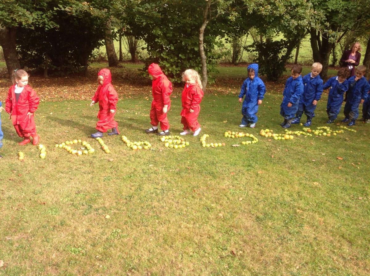 Making a numberline out of apples, saying the numbers as we walk along it.