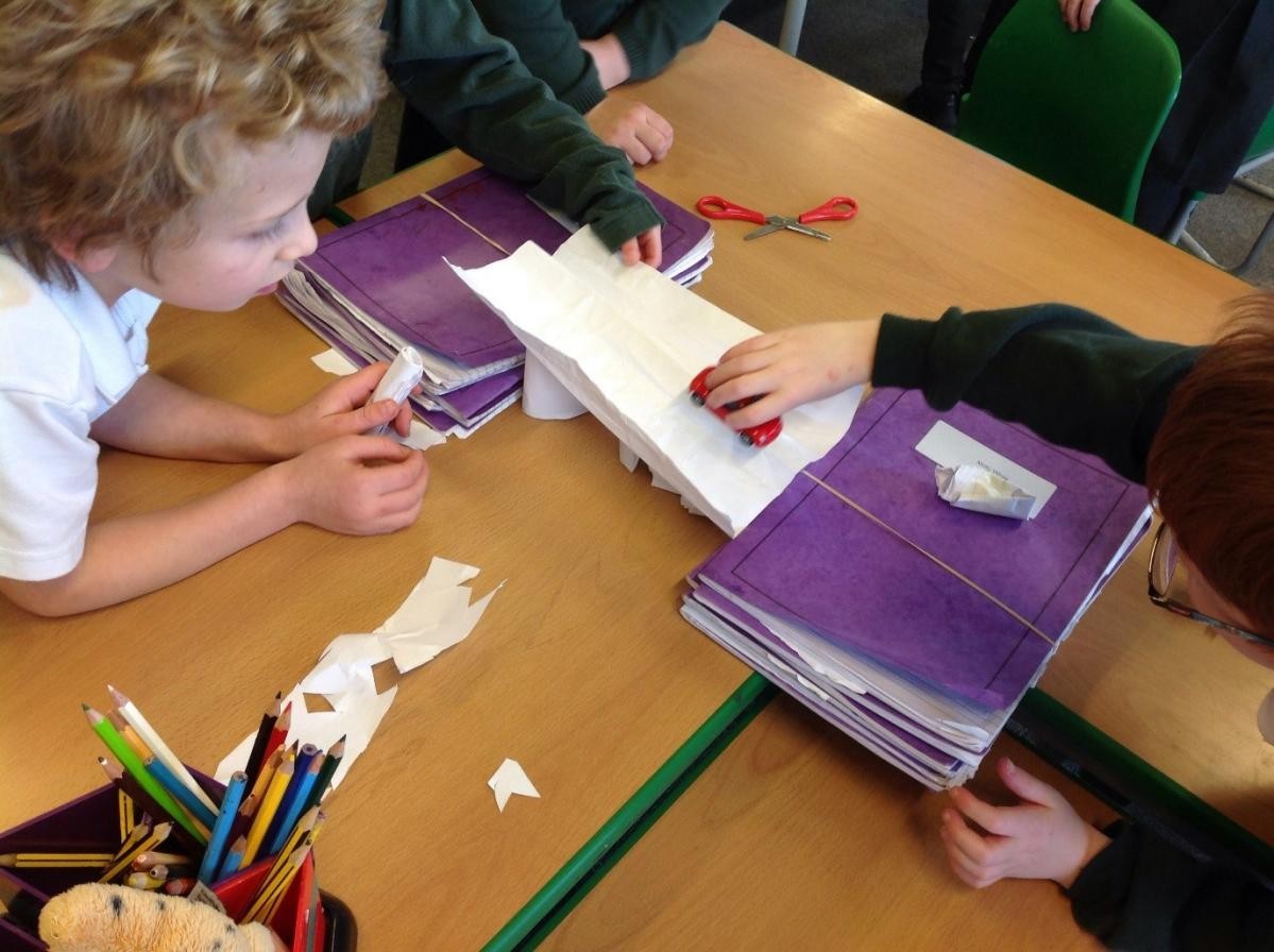 Y2  making paper bridges, investigating how to make the strongest bridge.  