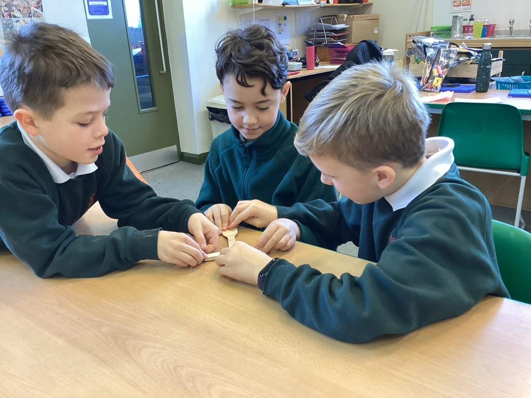 To launch our Romans topic in KS2, children took part in workshops learning how to make a catapult and a mosaic.