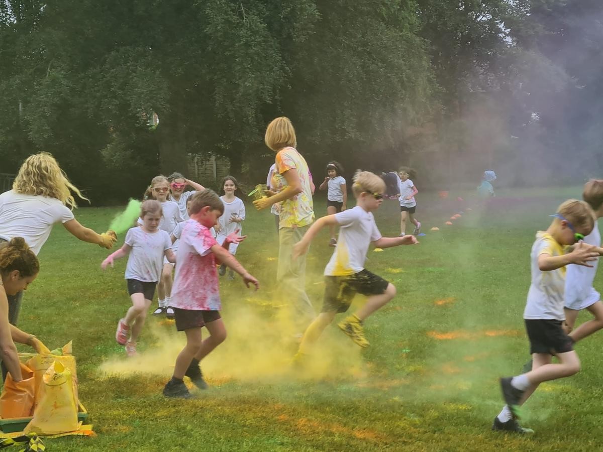 children running through a colour run 
