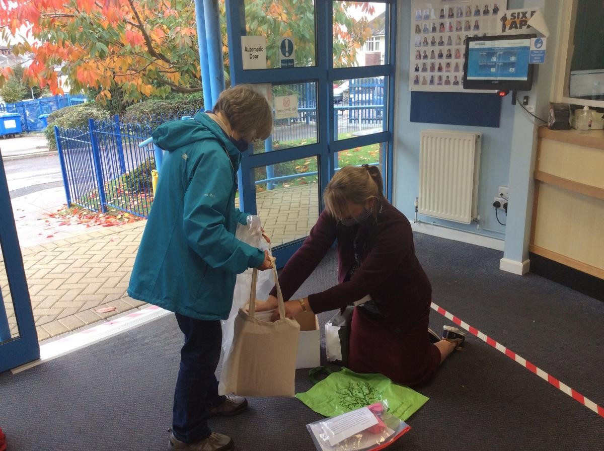 Passing the children’s letters to the Parish community