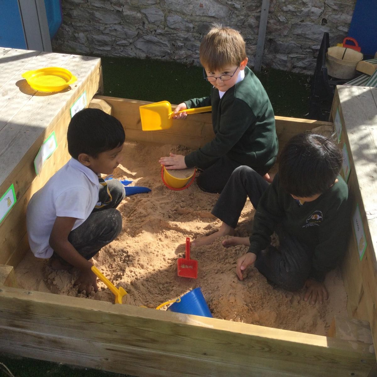 Sand play in our outside area
