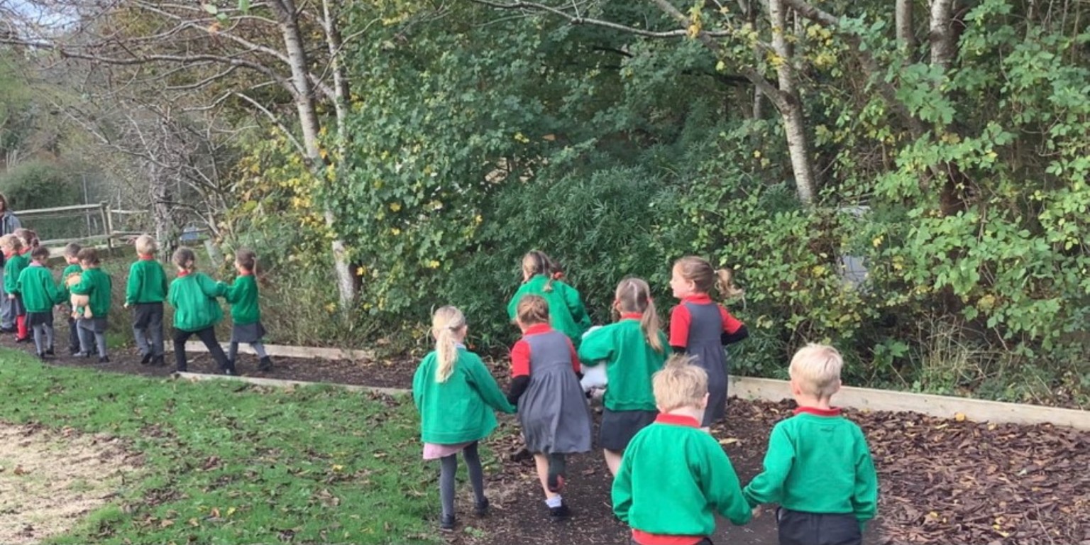  Enjoying a walk - listening, looking, and exploring.