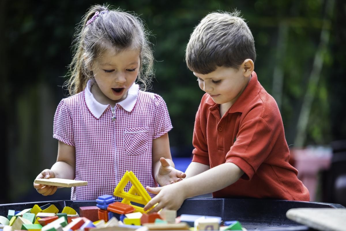 Children engaged in an activity outdoors