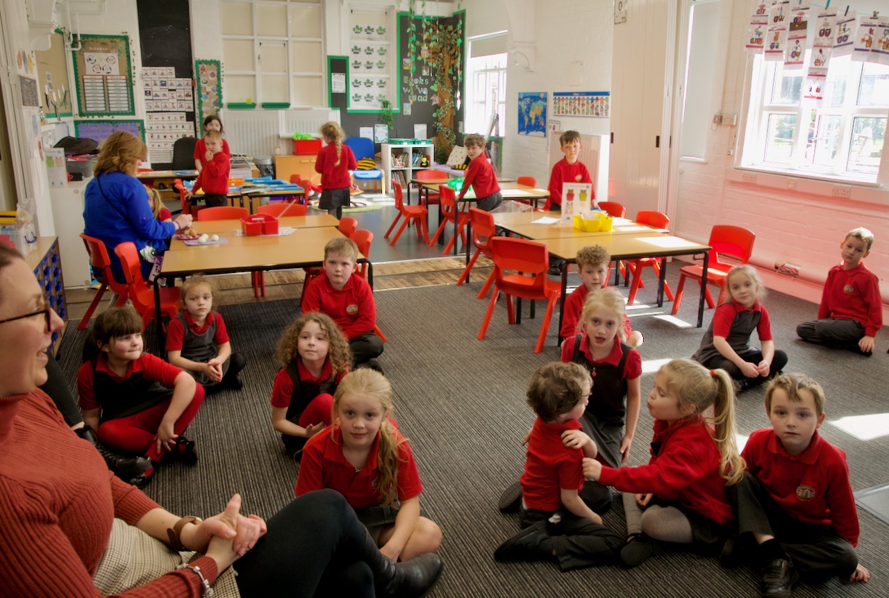 Children sat in a classroom 