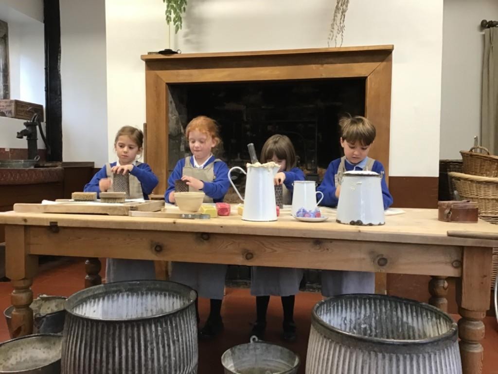 Year 2 experiencing a Victorian way of life at St John's House.