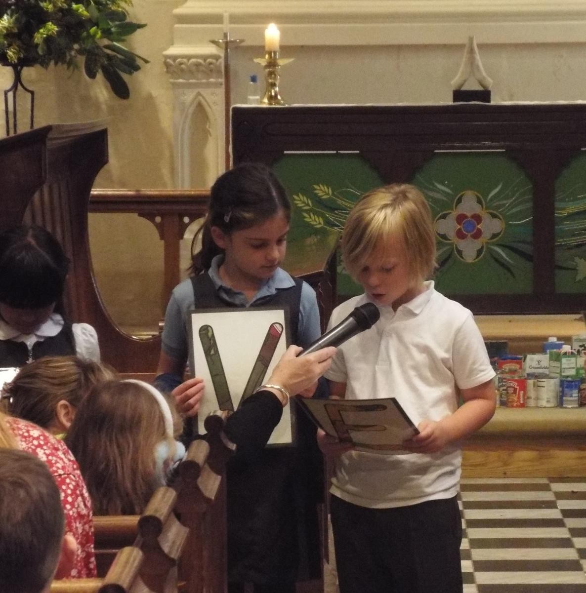 Year 2 children led the Harvest service