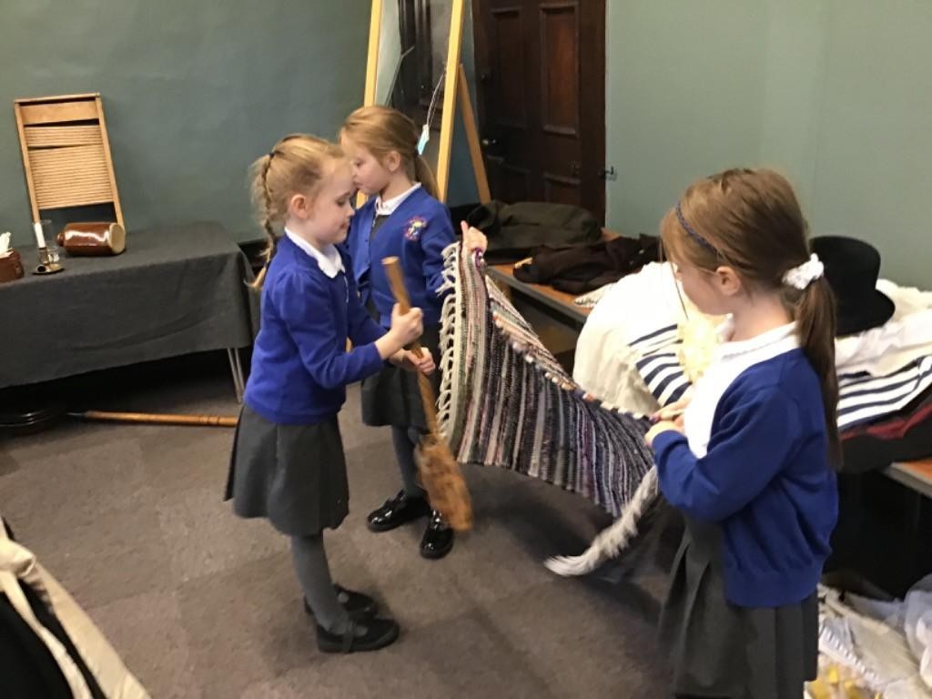 Year 2 experiencing a Victorian way of life at St John's House.