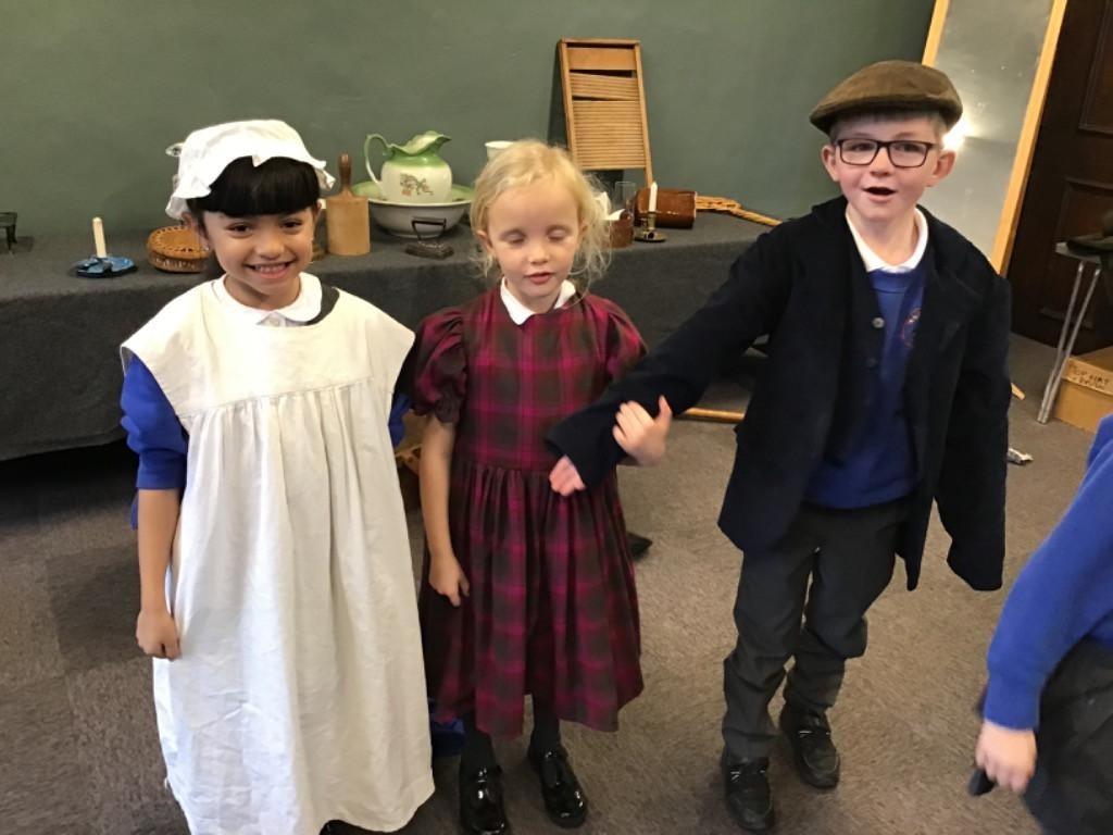 Year 2 experiencing a Victorian way of life at St John's House.