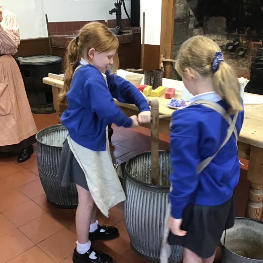 Year 2 experiencing a Victorian way of life at St John's House.