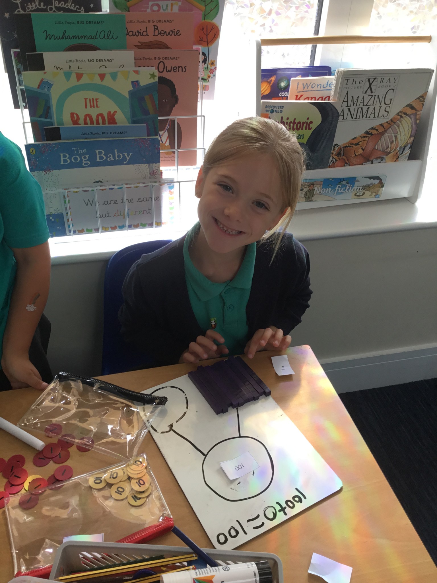 In maths we have been learning to partition 2-digit numbers. 