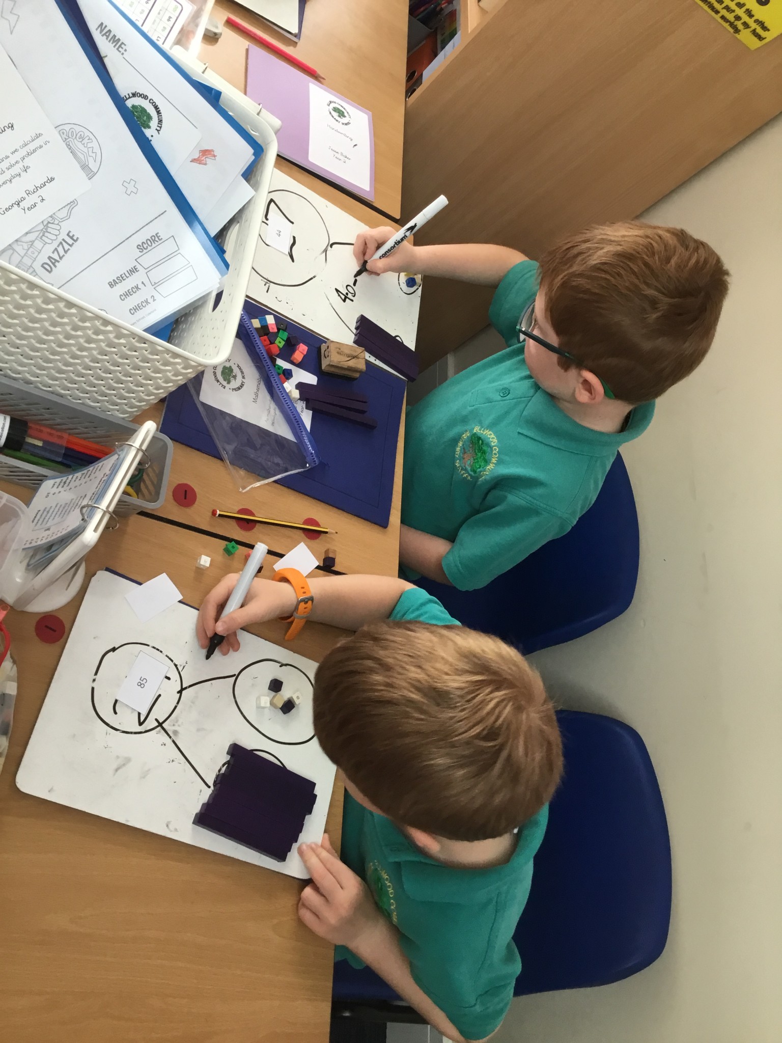 In maths we have been learning to partition 2-digit numbers. 