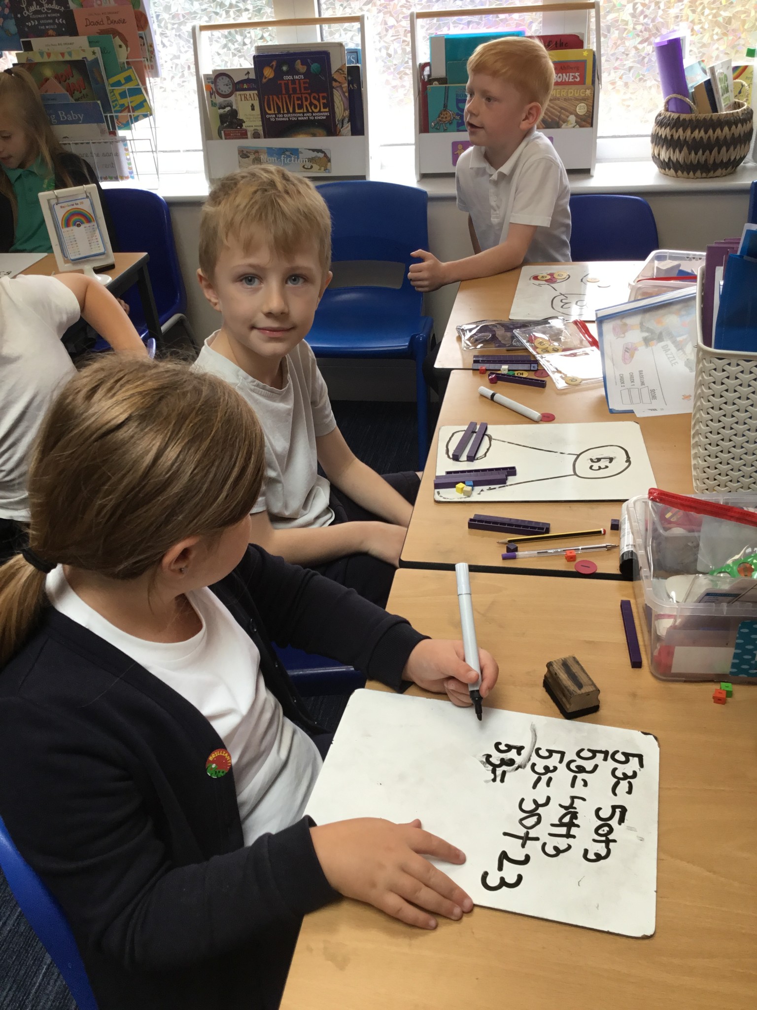 In maths we have been learning to partition 2-digit numbers. 