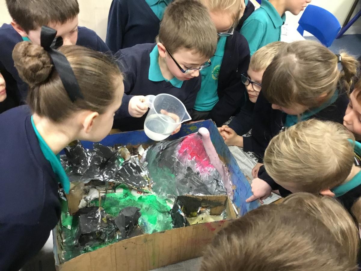 Beech class used bicarbonate of soda and vinegar to erupt their model volcanoes.