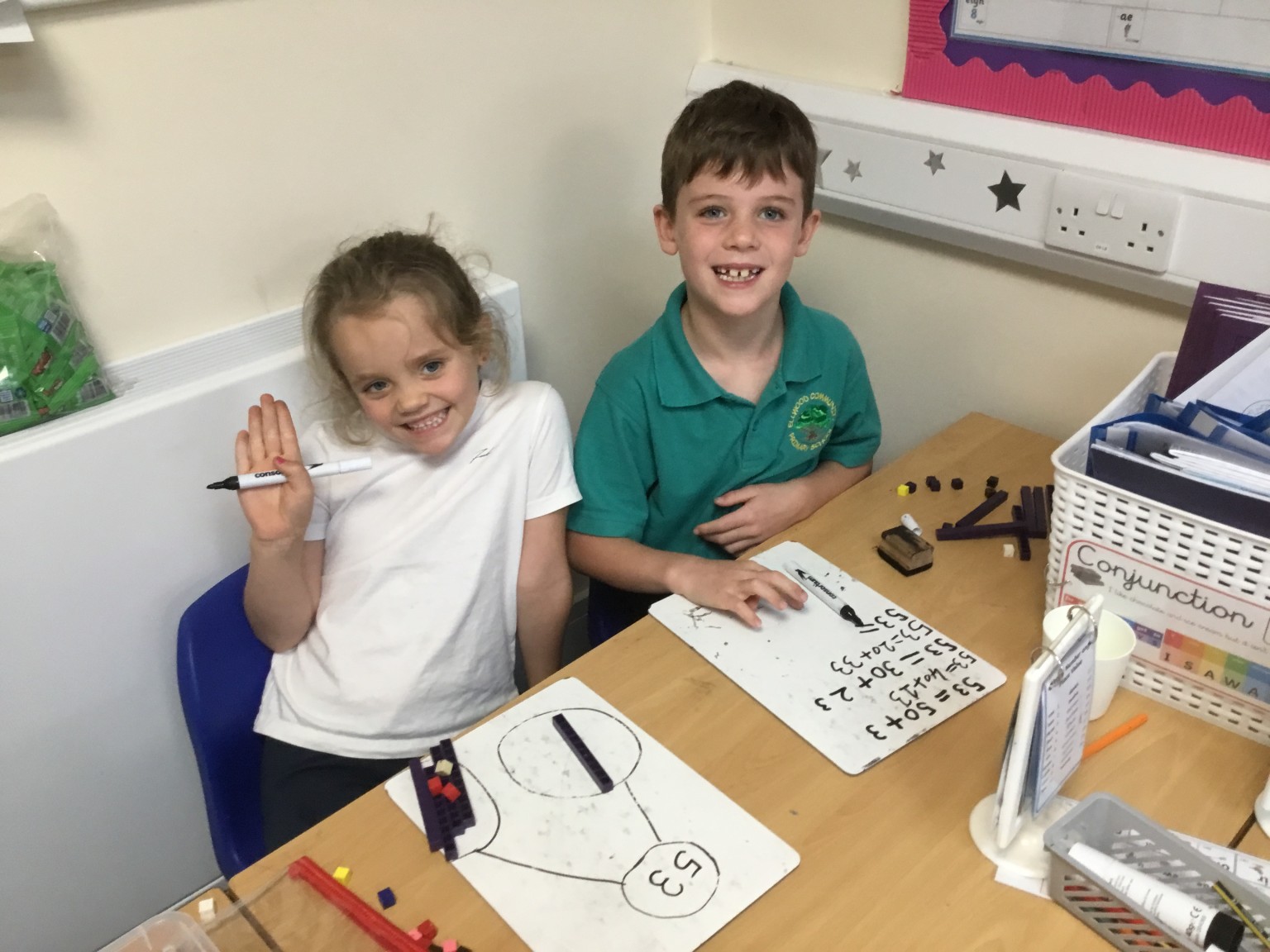 In maths we have been learning to partition 2-digit numbers. 