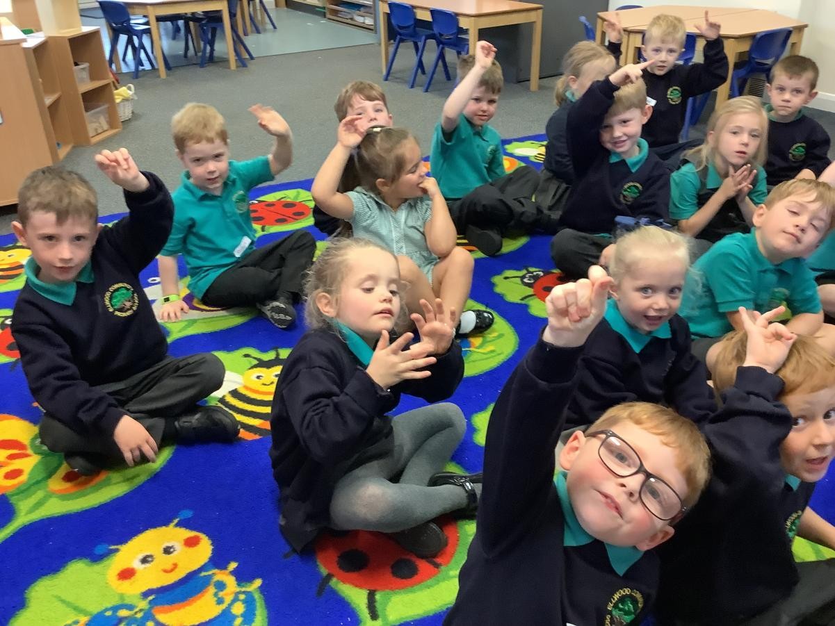 We are exploring high and low sounds, when making a high sound we raised our arms. When we made a low sound we would get as low as possible.