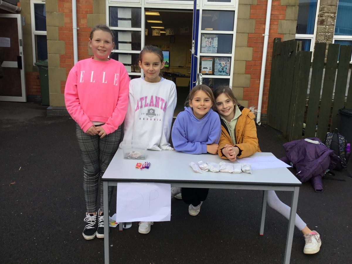 Year 5 girls organised their own sweet sale to raise money for a children's charity 